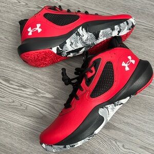 Under Armour Size: M9.5 W11. New without box.